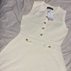 Chic Cream Sleeveless Dress with Gold Accents